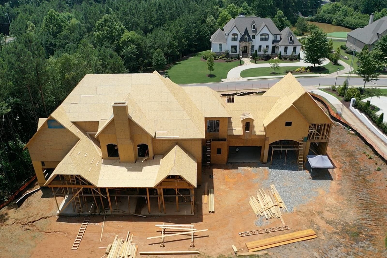 Aerial view of a large custom home framed and roof sheathed by PRL Framing Carpentry in Metro Atlanta, Georgia