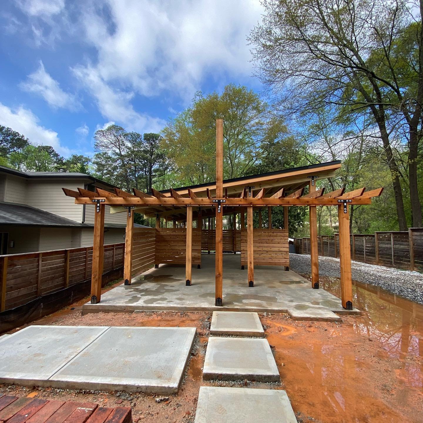 Cedar carport, porch and pergola framed and roofed in Grant Park, Atlanta