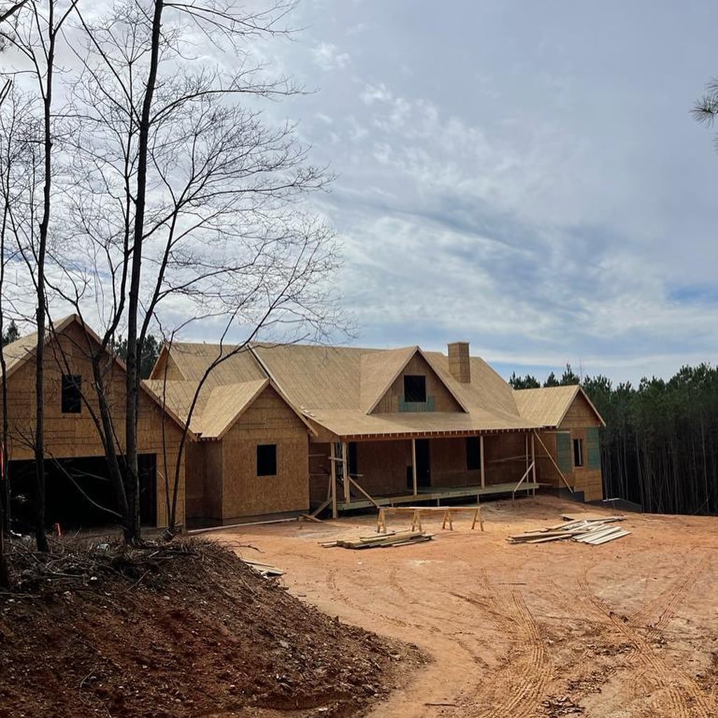 Ranch home with a framed front porch in Buchanan, Georgia